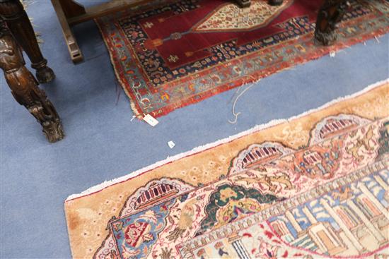 A Caucasian red and blue ground rug W.174cm x 120cm